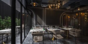 11 Restaurant Bar Nolm Cafe Restaurant interior featuring intimate seating and contemporary Thai design Passa Hotel Bangkok 1 - PASSA HOTEL BANGKOK