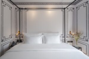 16. Room Minimalist boutique hotel room with king size bed and geometric Thai wall accents at Passa Hotel Bangkok - PASSA HOTEL BANGKOK