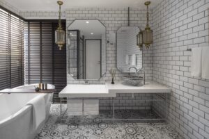 21. Room Elegant hotel bathroom at Passa Hotel Bangkok with freestanding tub and Moroccan style sink - PASSA HOTEL BANGKOK